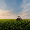 Tractor driving in a farmer's field